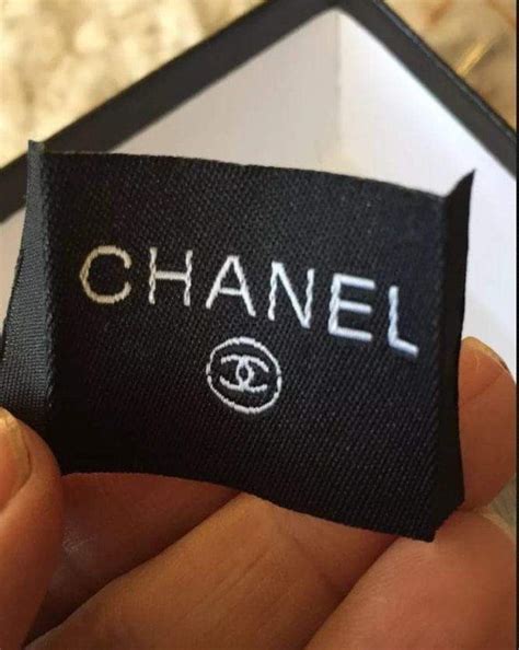 chanel metal tag|Chanel clothing tags.